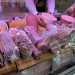 Davanti a noi il bancone espone in bella vista mortadella, fesa di tacchino, speck, bresaola e salame